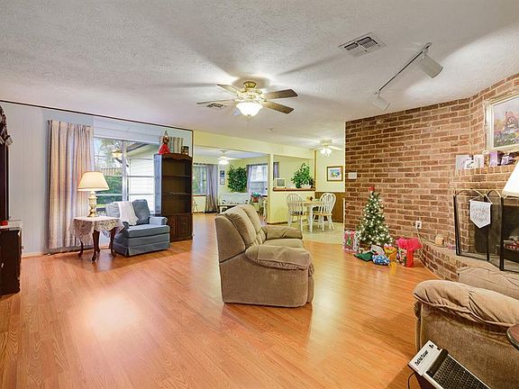 The family room has plenty of space for oversized furniture