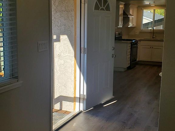 Front entry looking towards dining room and kitchen