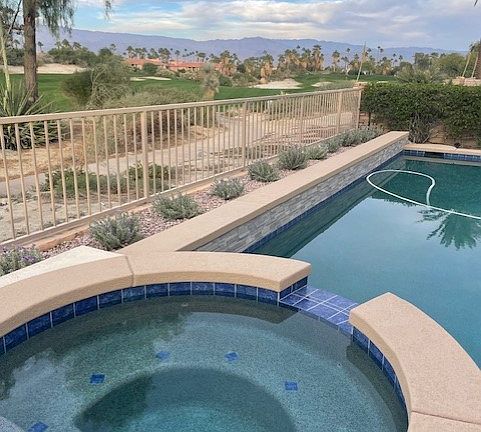 Newly refinished pebble-tech salt-water pool and spa. Very private location. No houses look onto this property.