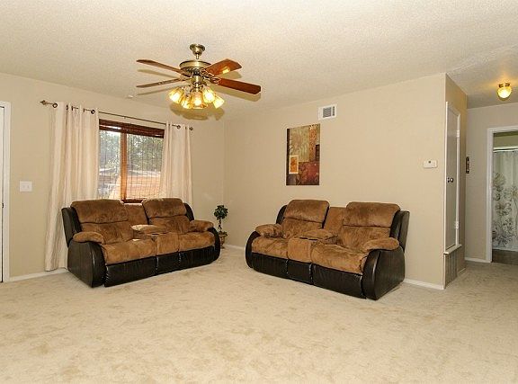 Picture window overlooks front yard.