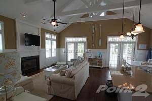 View of living room and front doors