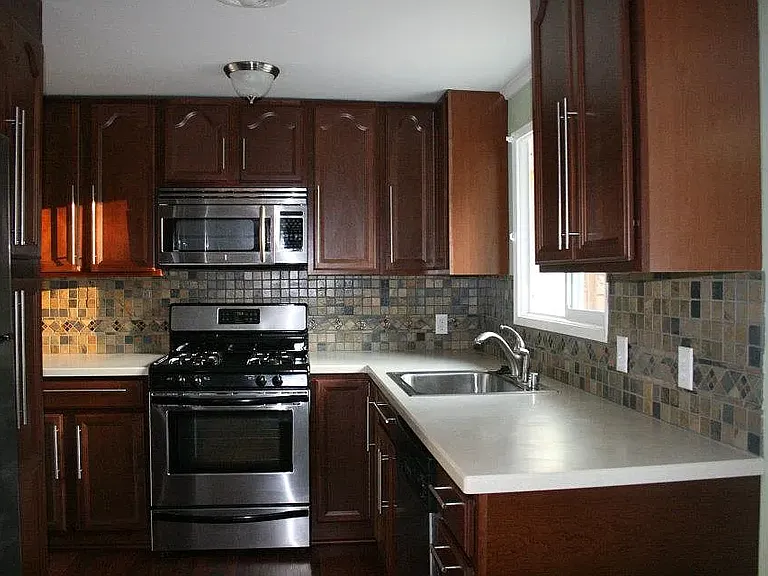 Kitchen with gas stove and stainless steel appliances
