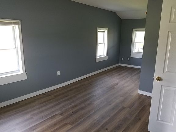 Huge over sized bedroom with new laminate floor and a large closet.