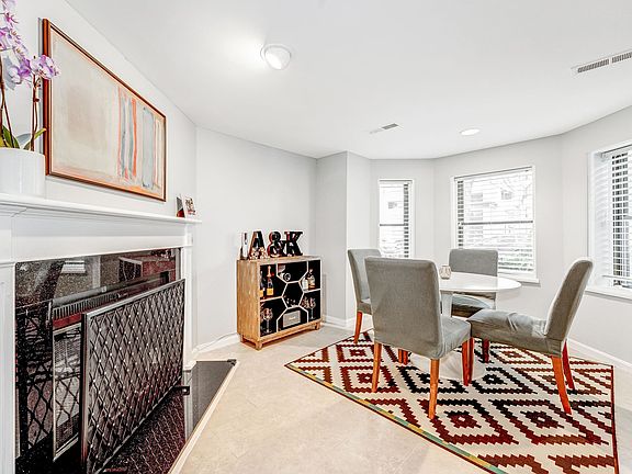 Working wood-burning fireplace accents the dining room!