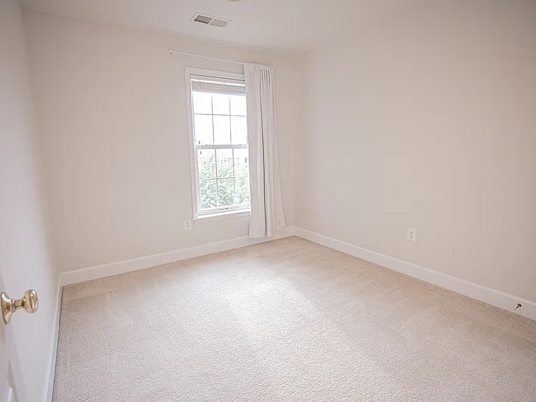 Bedroom 1 is the perfect size for a kids or guest bedroom or an office