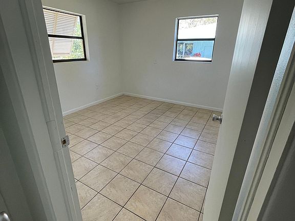 Corner bedroom on the NW side of the house. One of three bedrooms.