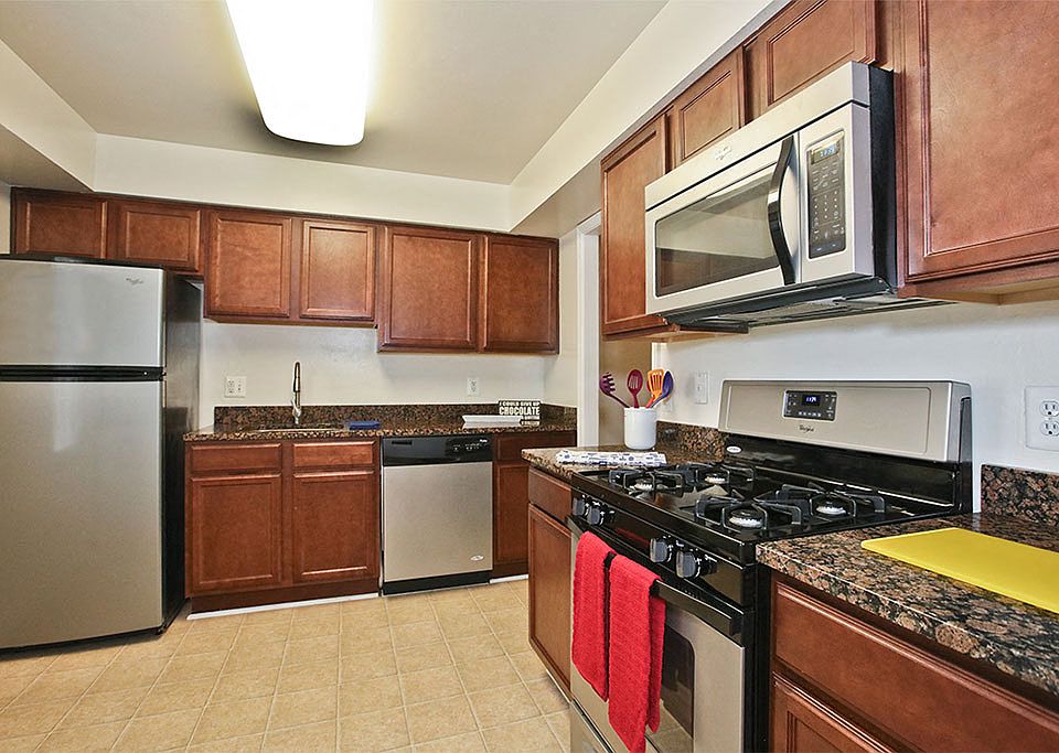 A Kitchen complete with a Gas-Range Stovetop at Fairfax Square