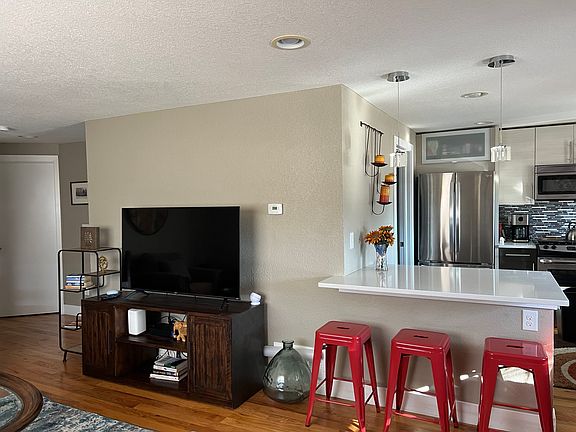 Kitchen peninsula with bar seating
