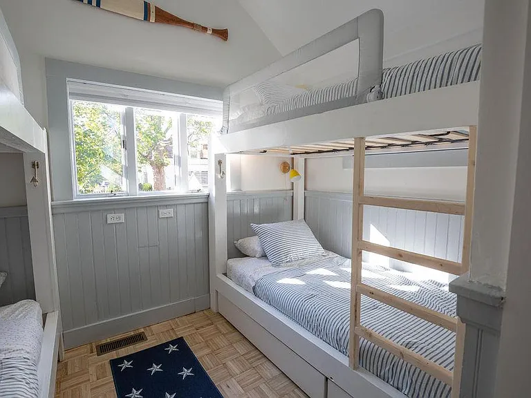 4 XL twin beds, storage under beds, ensuite full bathroom, laundry in closet, blackout shades