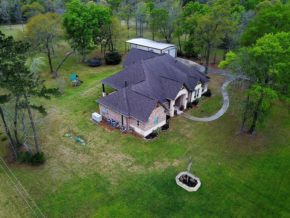 5 unrestricted acres zoned to The Woodlands schools (Bush, Mitchell, McCullough, TWHS) and just minutes from I45!