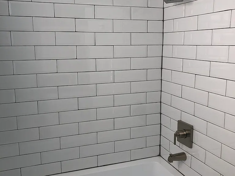Soaker tub with rain showerhead