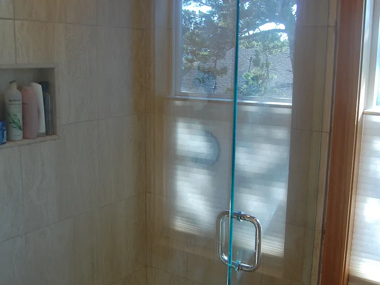 Custom Travertine Shower with Glass Door