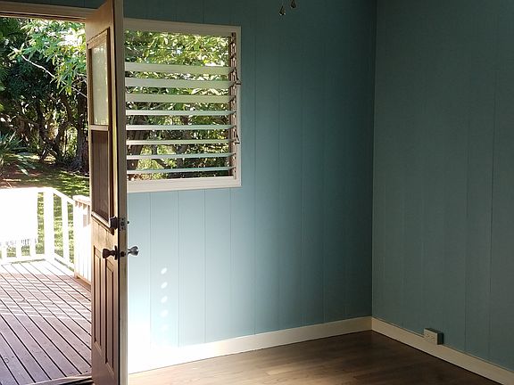 Master bedroom with ensuite bathroom and deck