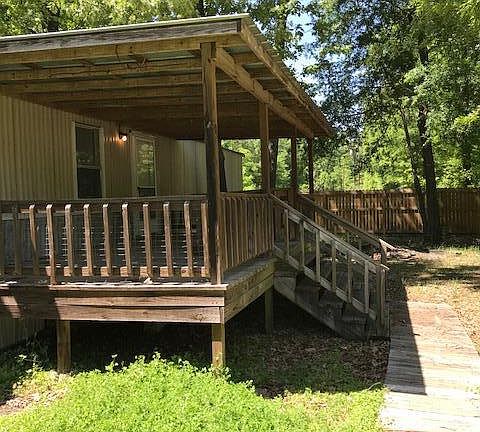 Front door/porch. Wooden walkway