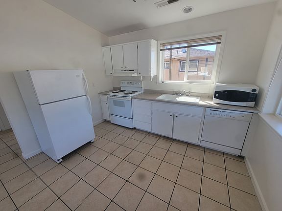 Kitchen- Microwave included with unit.
