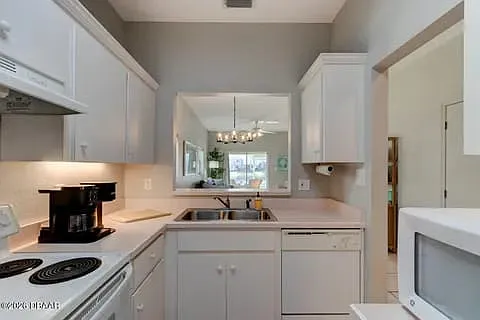 Kitchen 
Opens to Living Room