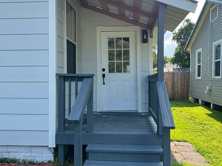 Side entrance into laundry room.