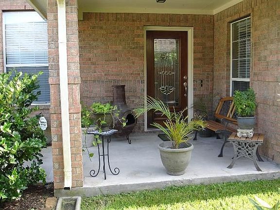 Front Porch with Wood Door