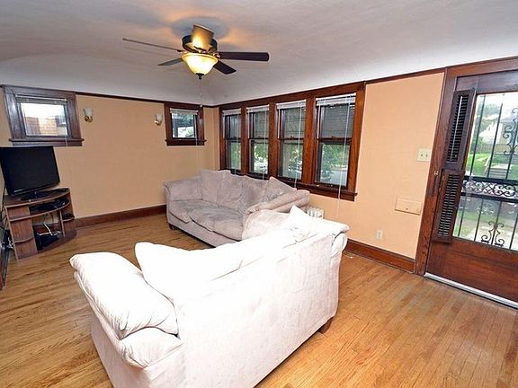 Large livingroom with hardwood flooring