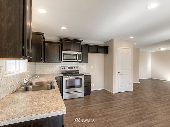 5th image of 10561 188th St Court E #247
