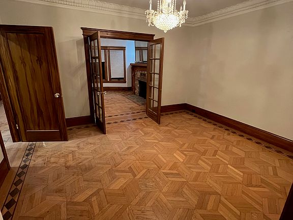 Formal dining room with parquet floors
