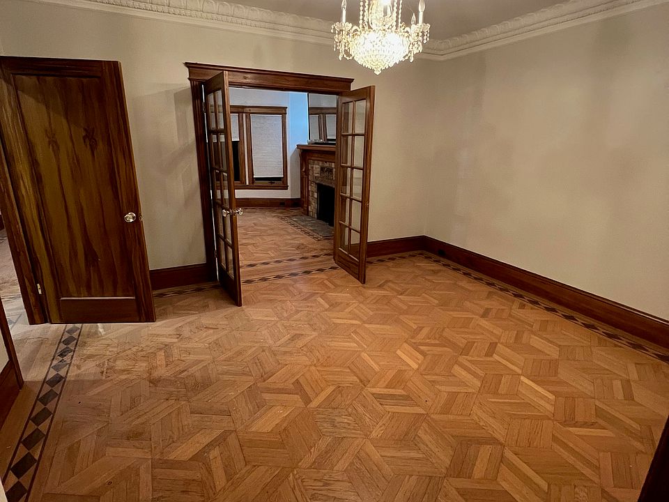 Formal dining room with parquet floors