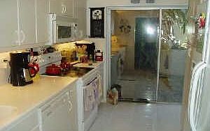 KITCHEN LOOKING TO ATRIUM