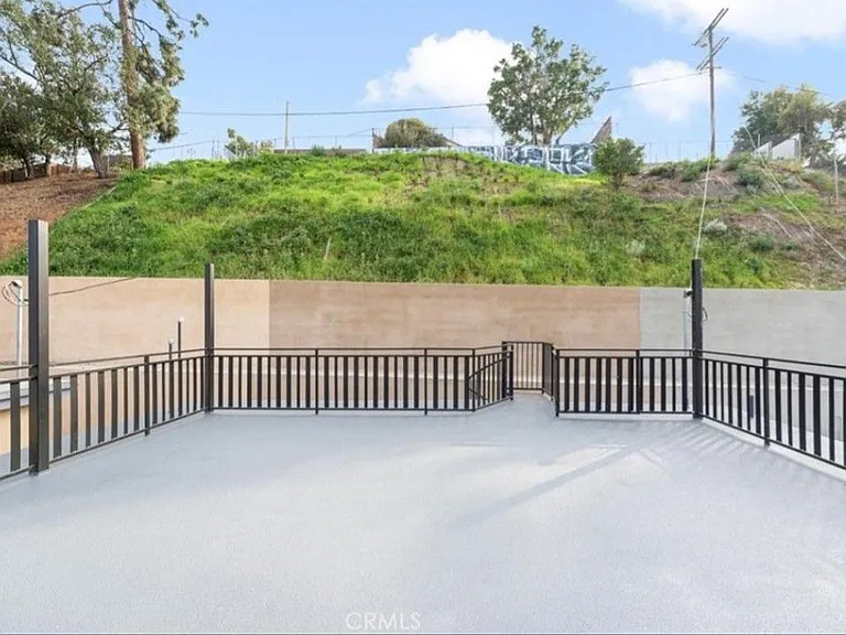 Upper rooftop deck, looking towards the back of the house
