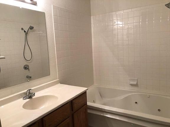 Master bath with jacuzzi tub and stand-alone shower