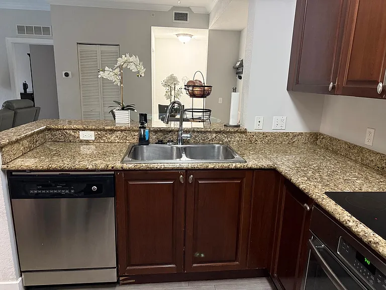 Kitchen view to Dining area and entry