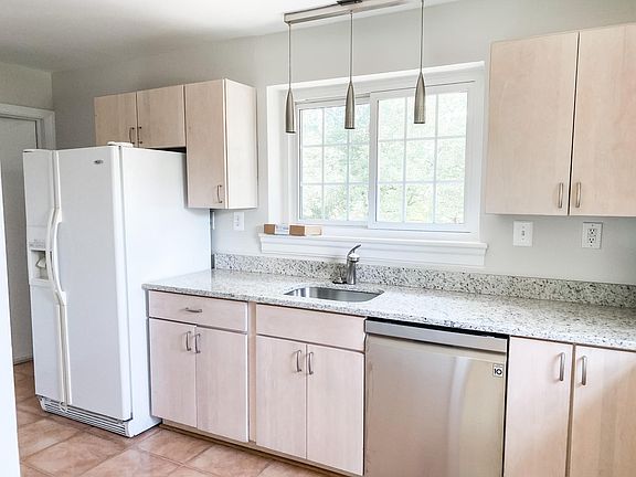 Updated kitchen with brand new countertop and dishwasher. Electric stove and oven replaced last year.