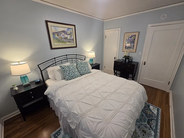 With a comfortable queen bed and a convenient main-floor location, this lovely bedroom is a perfect retreat. A mother-in-law favorite tested room!