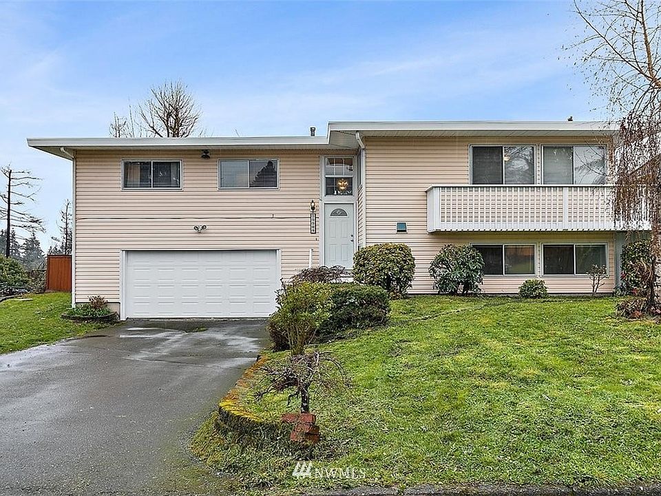 Welcome to this spacious home with wrap around deck, large front yard and ample parking spots.
