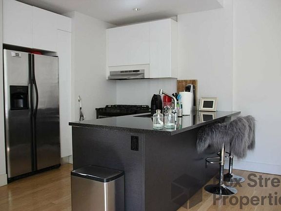 5th image of 114 Troutman St APT 228