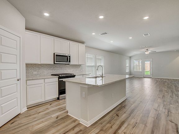 Cook your favorite meal in the beautiful kitchen.