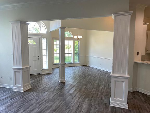 Front entry with living room on left as you walk in and dining on right as you walk in