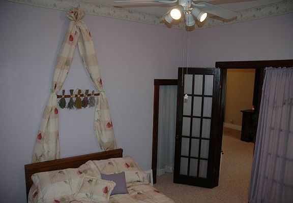 Master bed with french doors