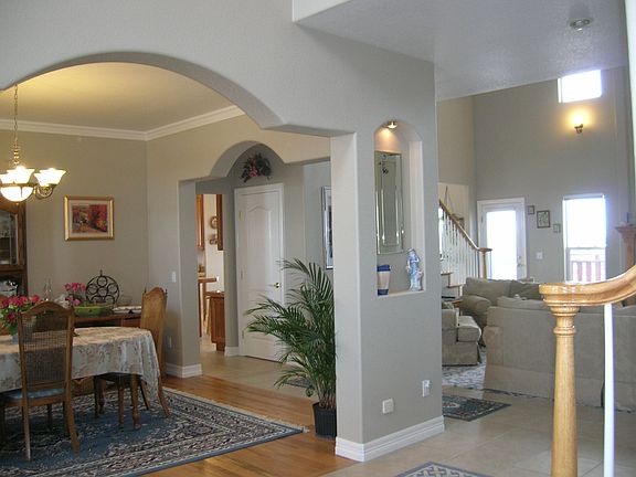 Open, Arched Entry Opening to Living/Dining Rm