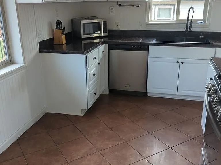 7821 N Raleigh St — Photo 6