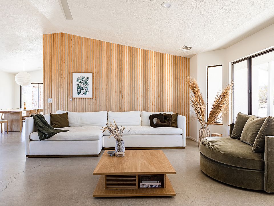 Airy open concept kitchen, living room, and dining room