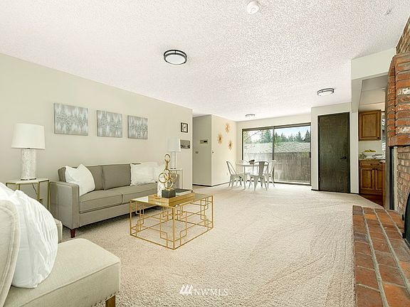Spacious Family Room with wood-burning fireplace