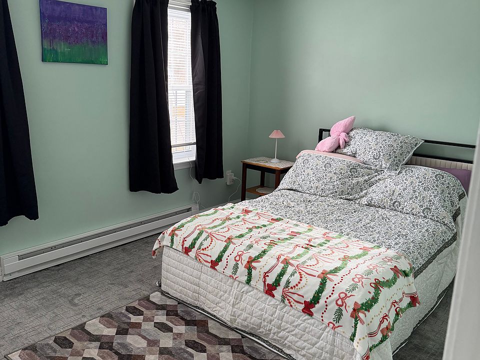 One bedroom full -size bed and closet with extra blankets one bureau
