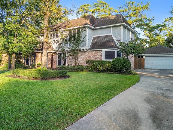 The updated landscaping adds to the gorgeous curb appeal.