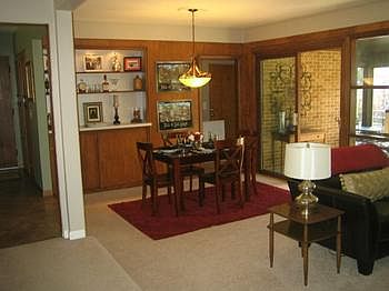Dining area just off the kitchen....note the built-ins!