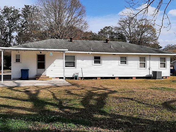 Back of home, covered patio
