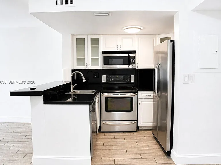 8695 NW 6th Ln #2-212 — Photo 3