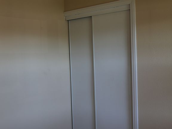 #3 bedroom tile floors with big closet and ceiling fan