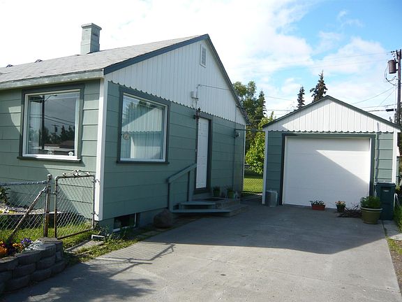 Southeast view with garage.