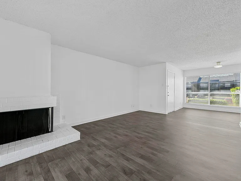 Spacious open floor plan with access to kitchen and fireplace