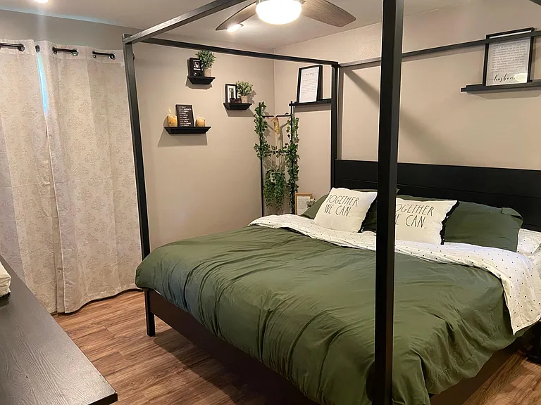 Primary bedroom - Spacious bedroom with natural light and neutral finishes